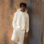 Confident black man in tracksuit